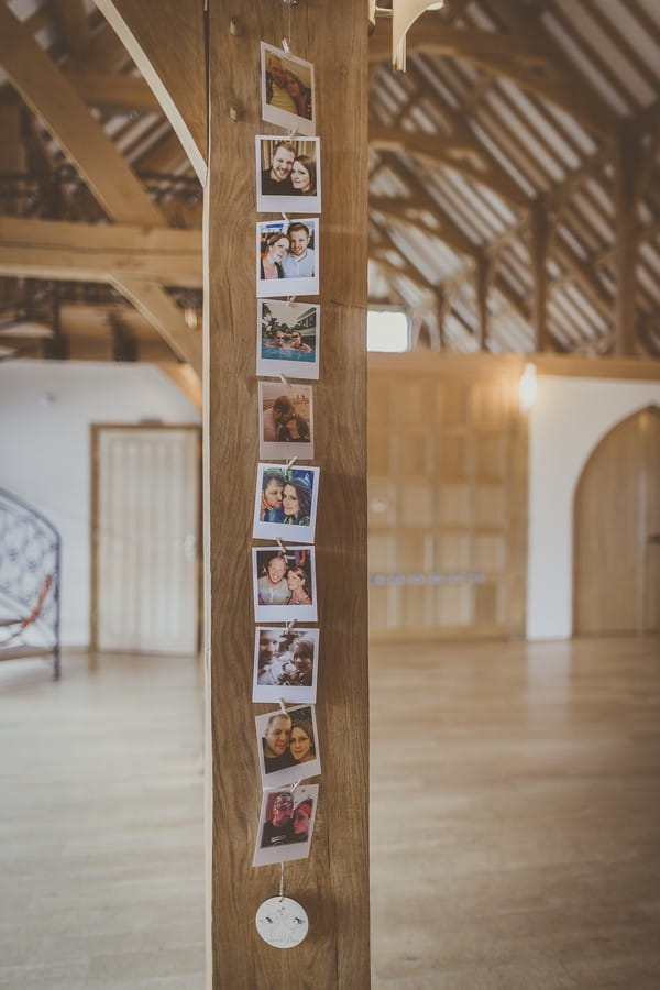 Pictures of couple hanging on beam