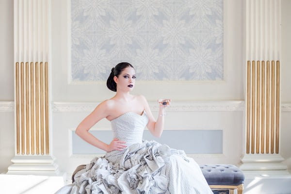 Bride in silver dress sitting