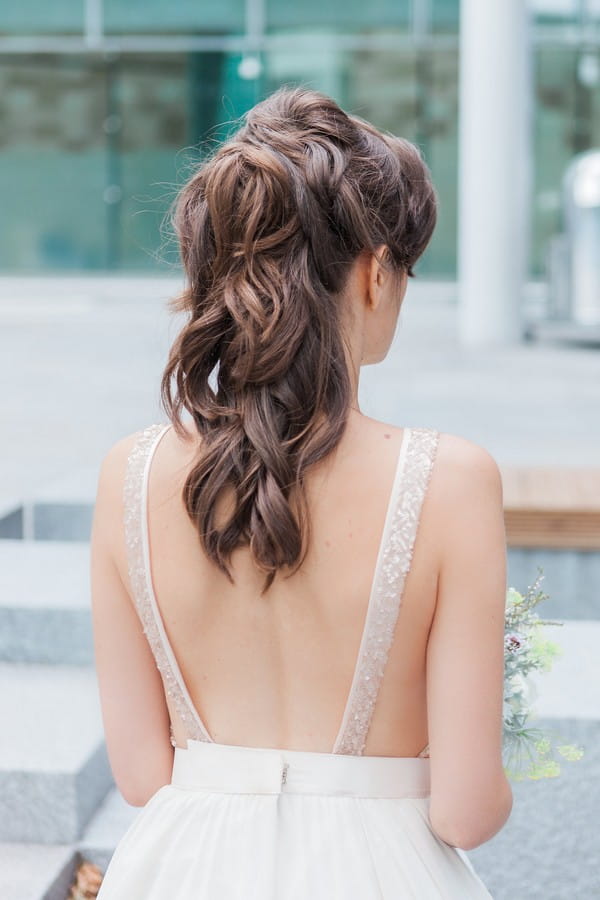 Bride's messy half up half down hairstyle