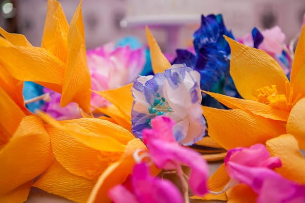 Brightly coloured tissue paper flowers