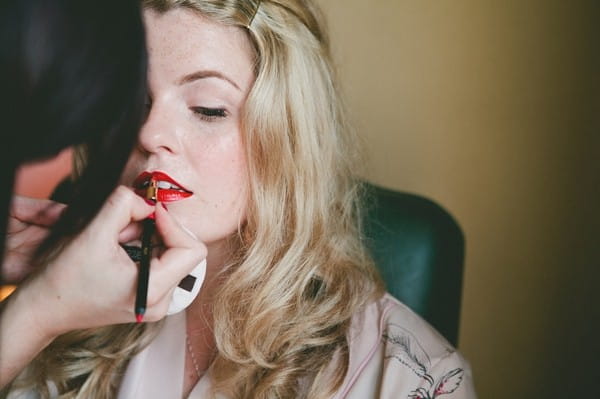 Make-Up Artisit Applying Lip Make-Up to Bride