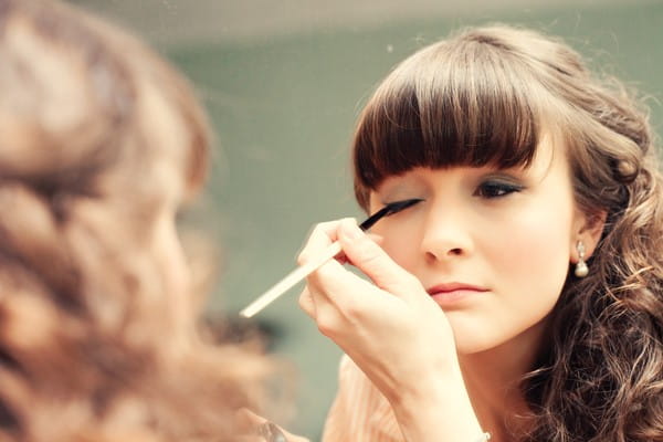 Bride Using Eyeliner Brush