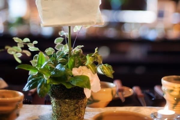 Moss Covered Pot on Wedding Table