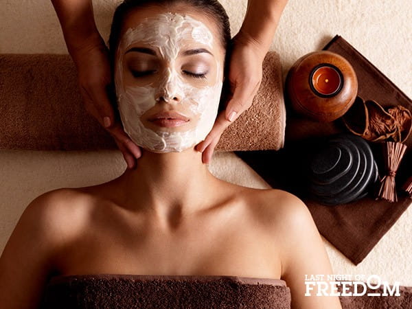 Woman having facial in spa