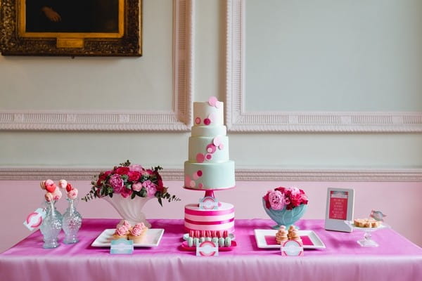 Wedding Cake Table with Pink Tablecloth