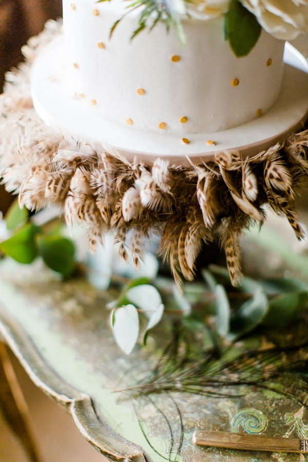 Feathers on bottom of wedding cake