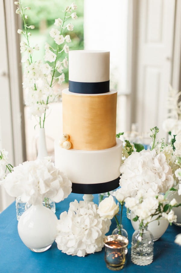 Blue and gold wedding cake