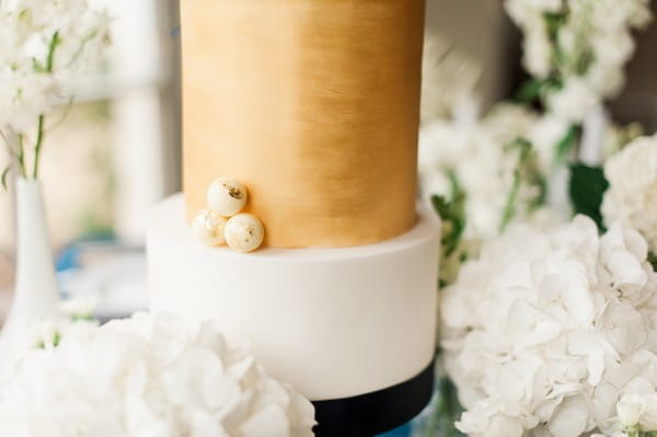 Detail on blue and gold wedding cake