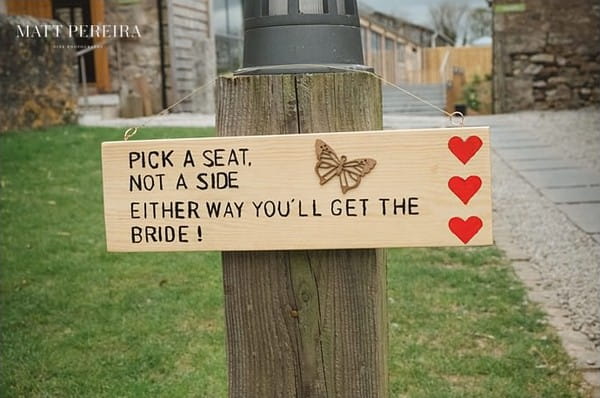 Pick a seat wedding sign