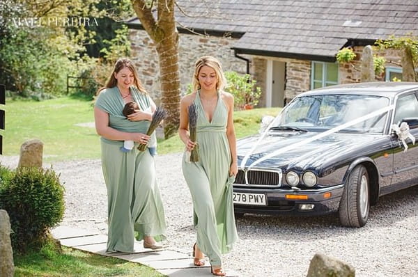 Bridesmaids in long green dresses