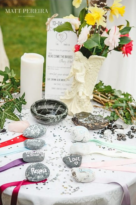 Stones and ribbons on handfasting table