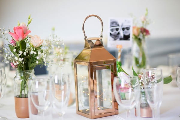 Copper lantern on wedding table