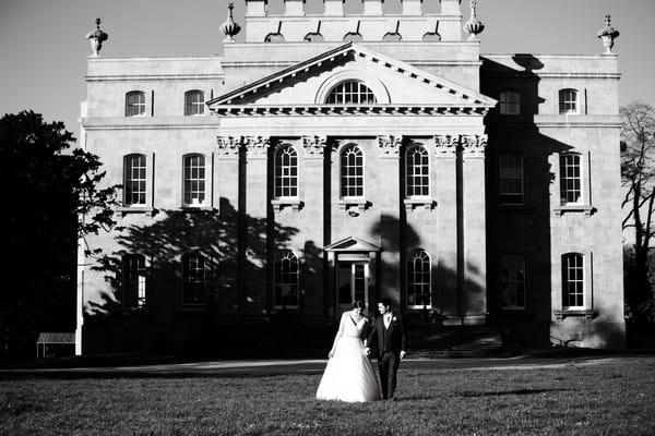 Bride and groom outside Kings Weston House