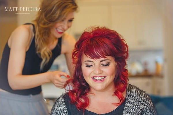 Bride having hair done