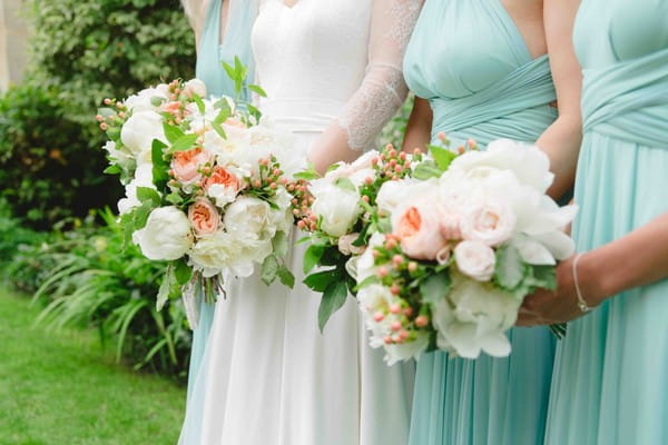 Bride and Bridesmaids Holding Bouquets