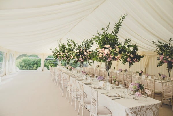 Tall Floral Wedding Table Centrepieces in Marquee