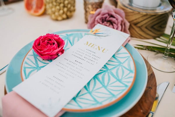 Wedding menu on bright blue plate