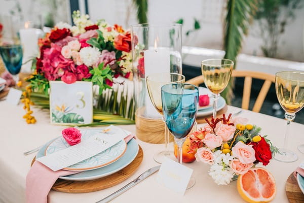 Bright and colourful tropical wedding table styling