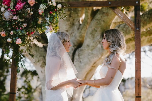 Bride facing each other during wedding ceremony