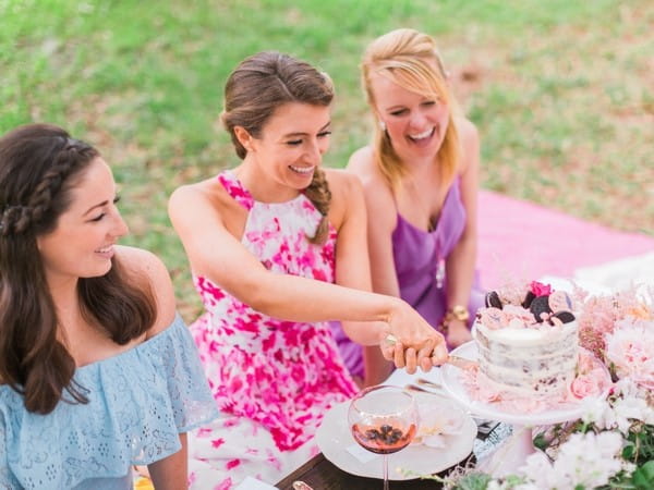 Girl cutting her Oreo hen party cake