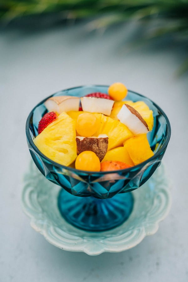 Tropical fruit in blue bowl