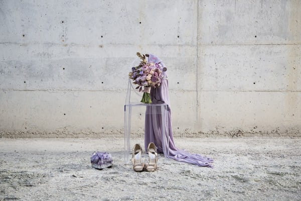 Purple bridal bouquet on Ghost chair