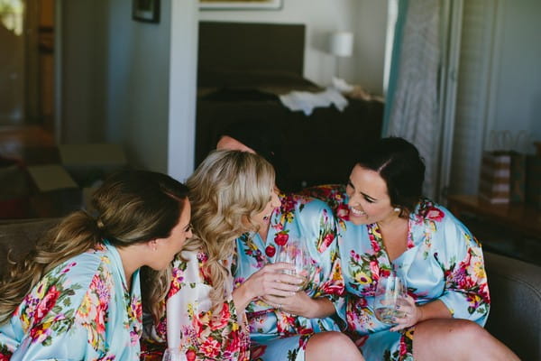 Bride and bridesmaids during morning preparations