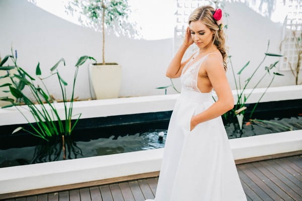 Bride with hand in pocket