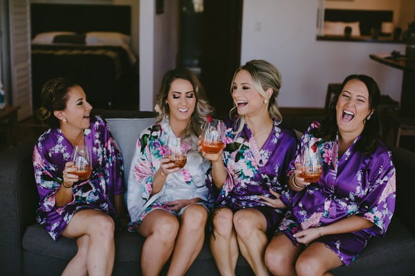 Bride and bridesmaids during morning preparations