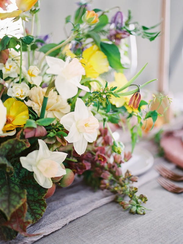 Yellow and white wedding table flowers