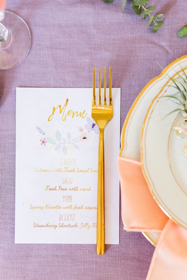 Gold fork on wedding menu