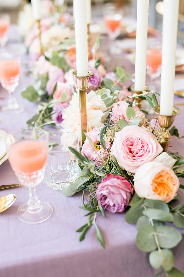 Violet and peach wedding table flowers