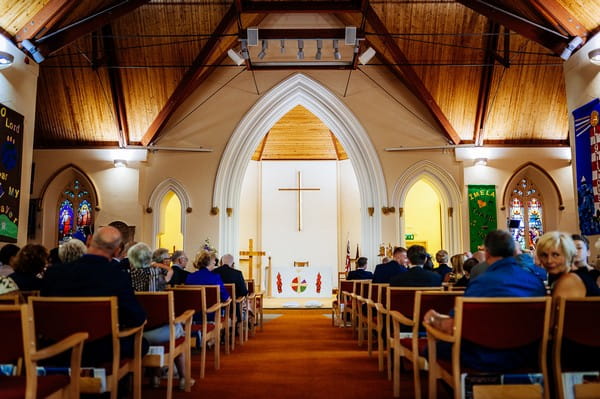 Wedding congregation inside St Luke's Church Crosby