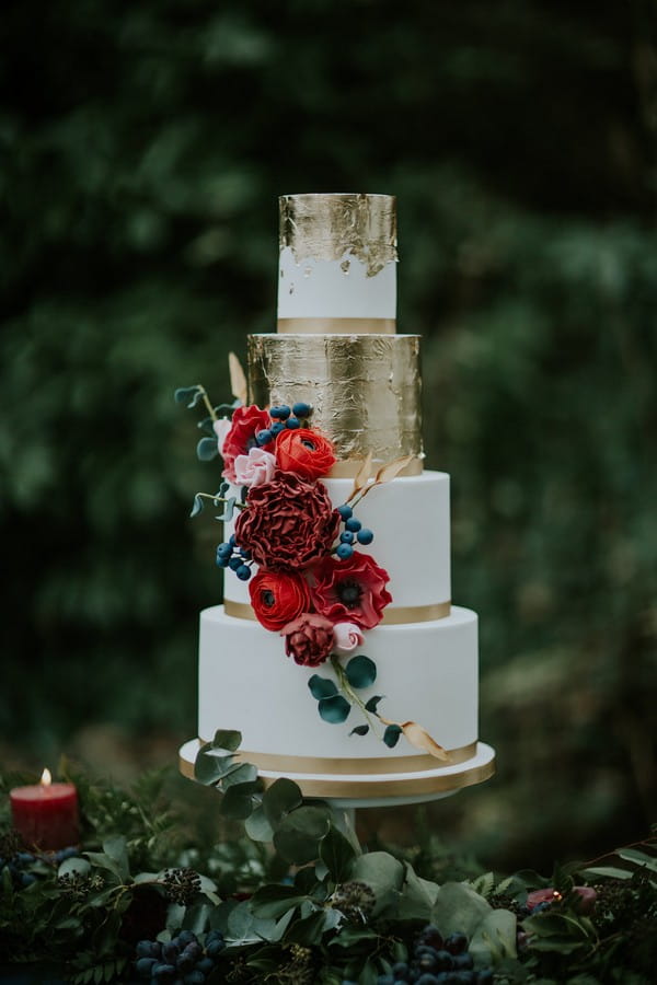 White and gold tiered wedding cake