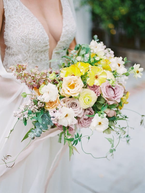 Large bridal bouquet with yellow and blush flowers