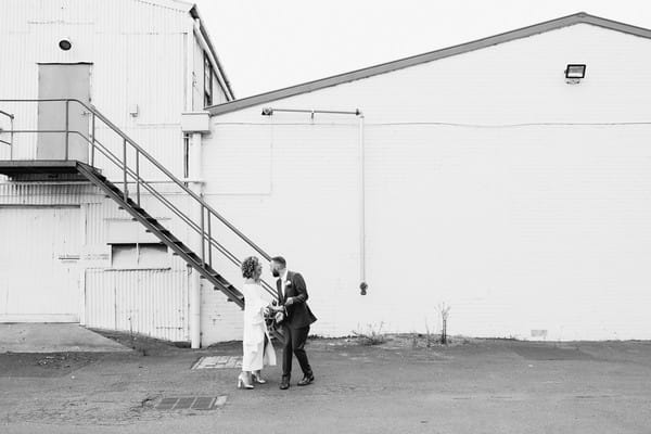 Bride and groom outside Gather and Tailor urban warehouse wedding venue
