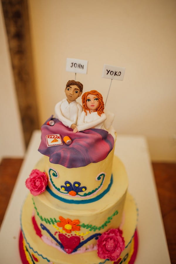 Wedding cake with John and Yoko cake topper