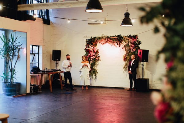 Groom wedding speech in warehouse