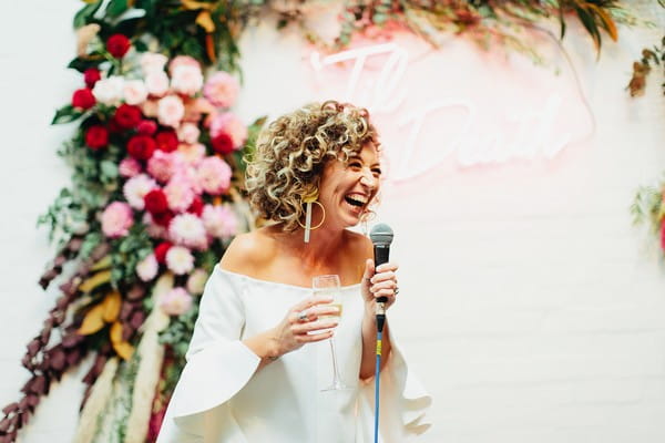 Bride laughing giving speech