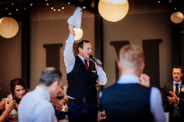 Surprise singing waiter at wedding