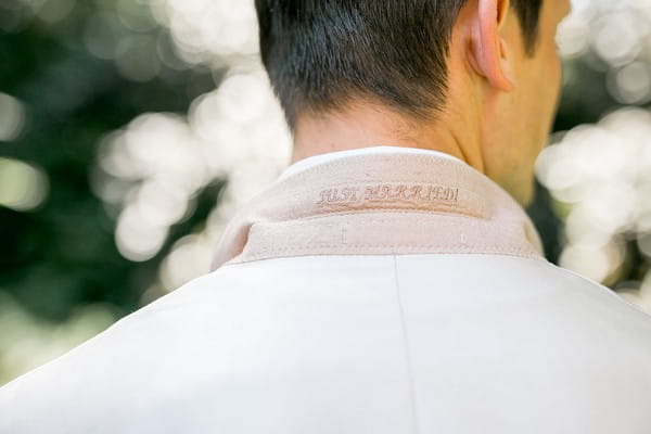 Just married written under groom's collar