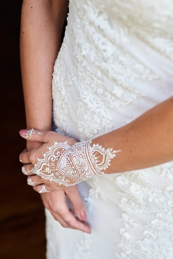 Bride with pattern painted on hand