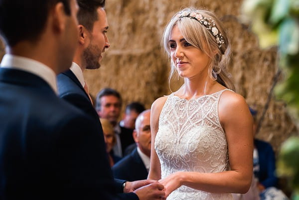 Bride and groom exchanging wedding vows