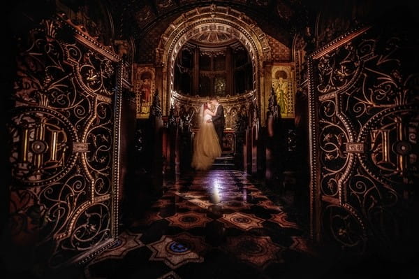 Bride and groom in the chapel of Crewe Hall - Picture by David Walters Photography