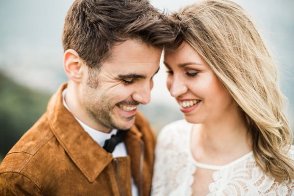 Bride and groom smiling together