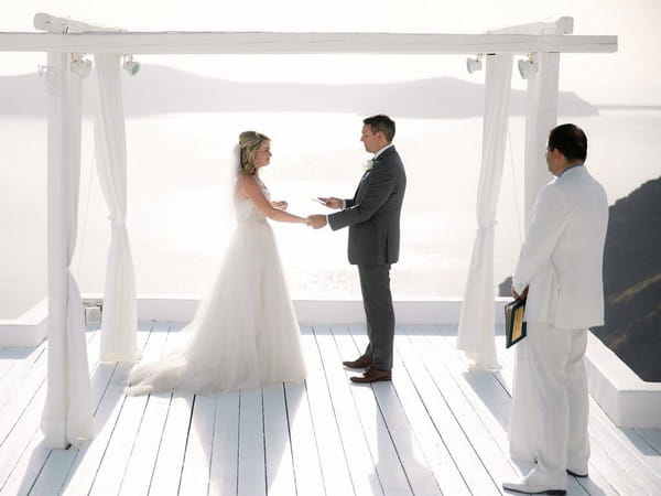 Bride and groom saying wedding vows