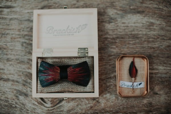 Bow tie and feather buttonhole