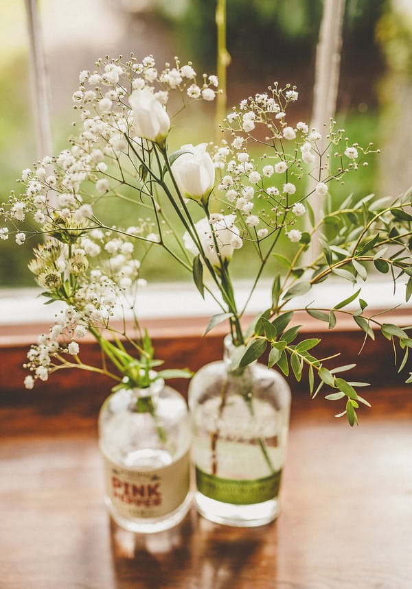 Flowers in glass bottle