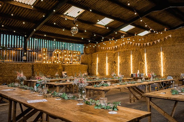 Wedding tables in cow shed