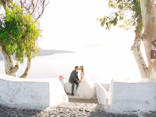 Bride and groom kissing